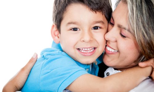 Affectionate mother and son - isolated over a white background