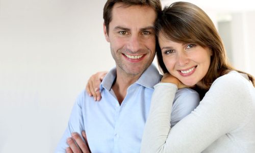 Portrait of married couple at home