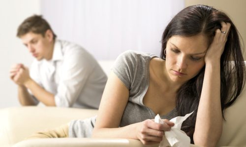 Young couple mad at each other in their home