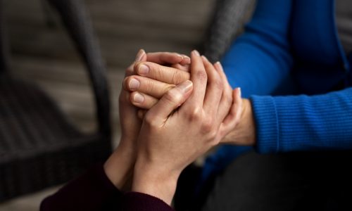 hands-holding-each-other-support