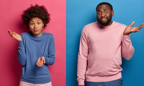 Hesitant questioned black woman and man shrug shoulders with clueless expressions, have no suggestions, spread palms with doubt, make decision, dressed casually, stand over pink and blue wall