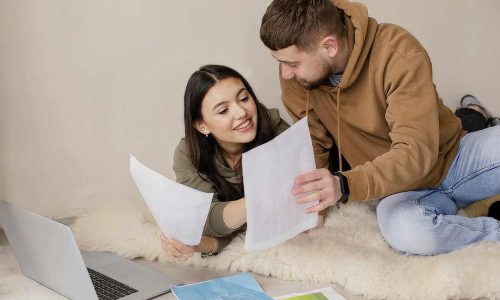 medium-shot-smiley-couple-indoors