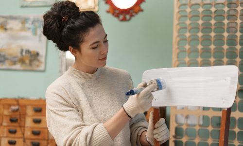 medium-shot-woman-restoring-wooden-furniture