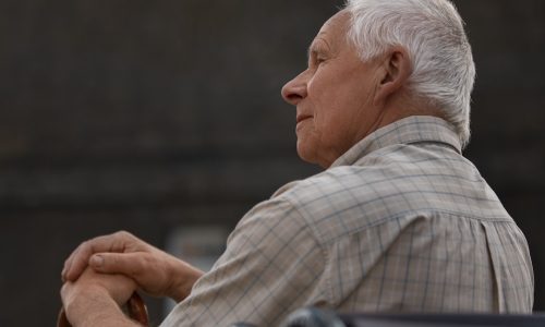 side-view-old-man-sitting-bench