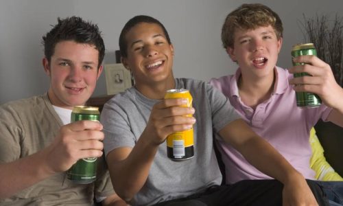 three teens drinking beer
